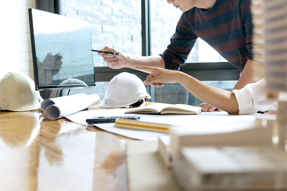 Consulting engineer reviewing project specifications